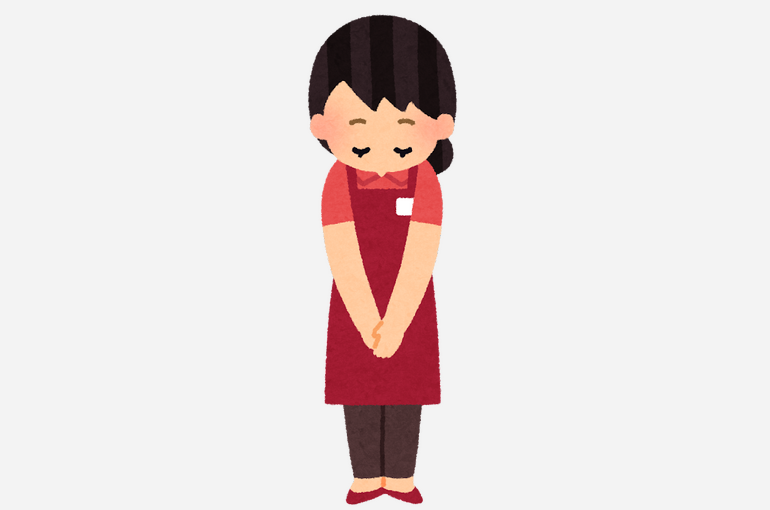 お辞儀をする店員　女性